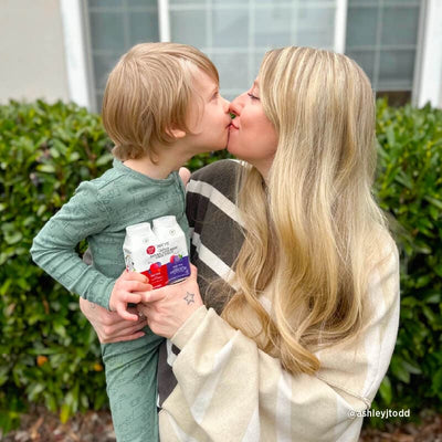 young boy and mom snuggle while holding maty's product